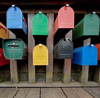 This is a picture of mailboxes in different colors