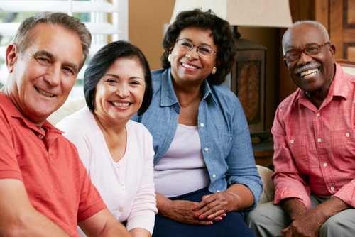 Photo of four people who are retirement age. Two women and two men. 